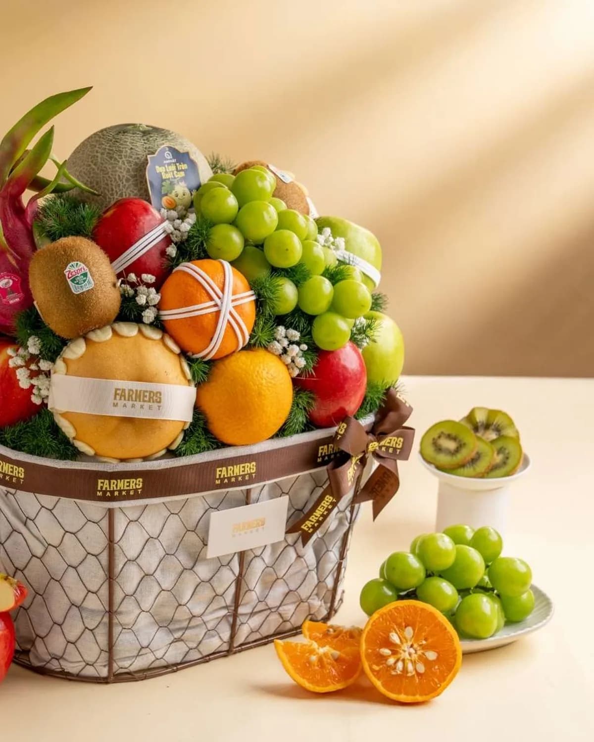 Giỏ trái cây cảm ơn An Nhiên giỏ mây nhỏ với lê Hàn, táo Ambrosia, kiwi vàng, cam, nho sữa
